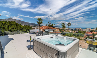 Unique luxury villa for sale in a modern, Andalusian architectural style, with sea views, within walking distance of Puerto Banus, Marbella 45901 