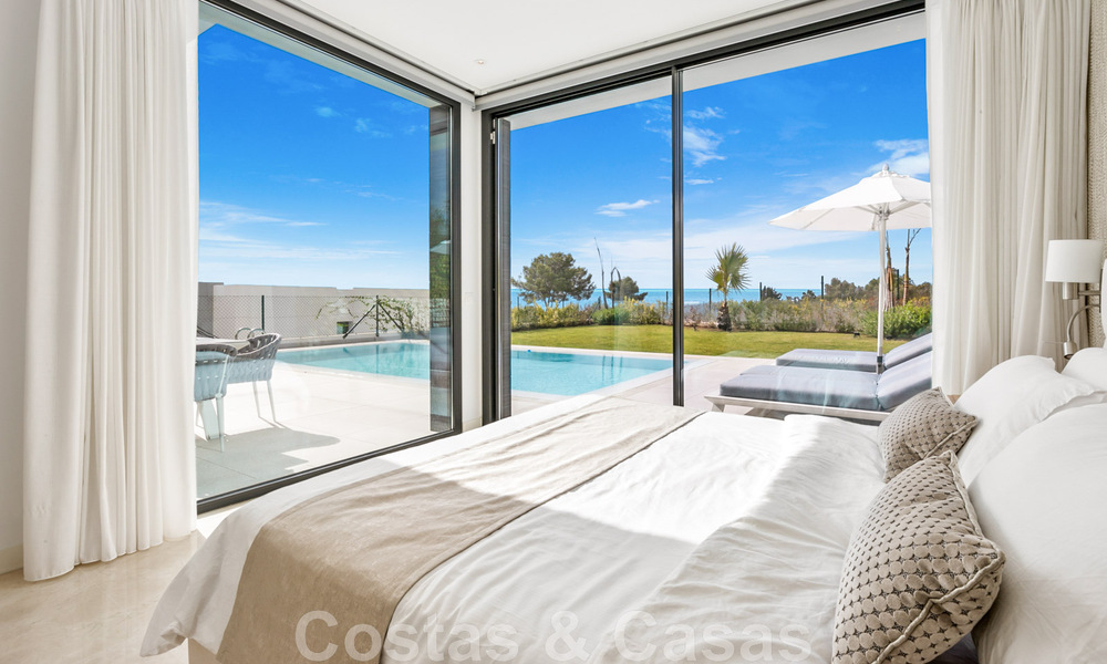 Move-in ready, contemporary villa for sale with sea views, in a gated villa development on the border of Mijas and Marbella 46105