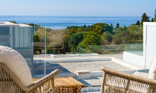 Move-in ready villa for sale with contemporary architecture in a gated villa community on the border of Mijas and Marbella 46381 