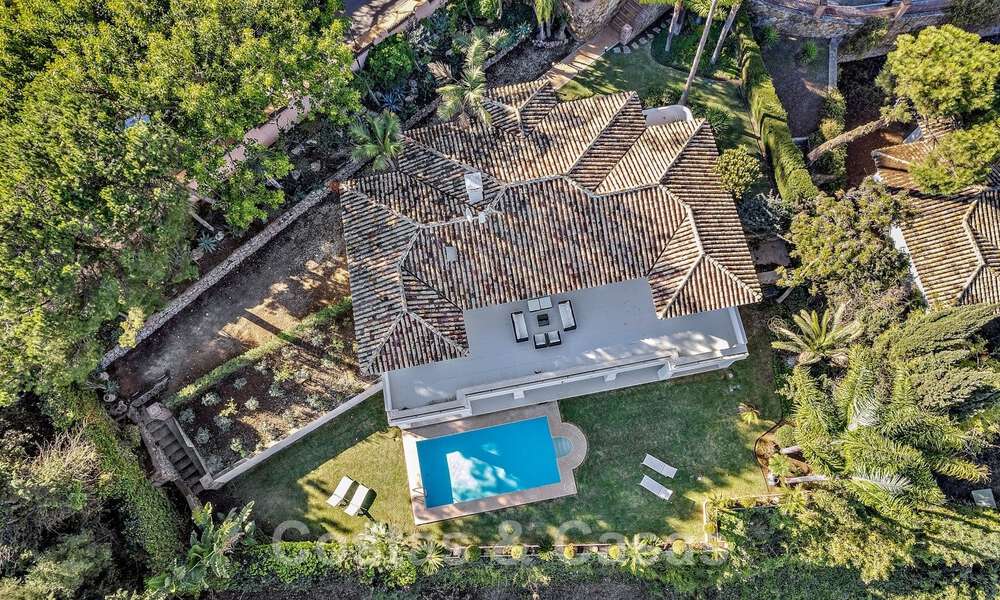 Andalusian luxury villa for sale adjacent to golf course, with sea views, in highly sought-after location in East Marbella 48332