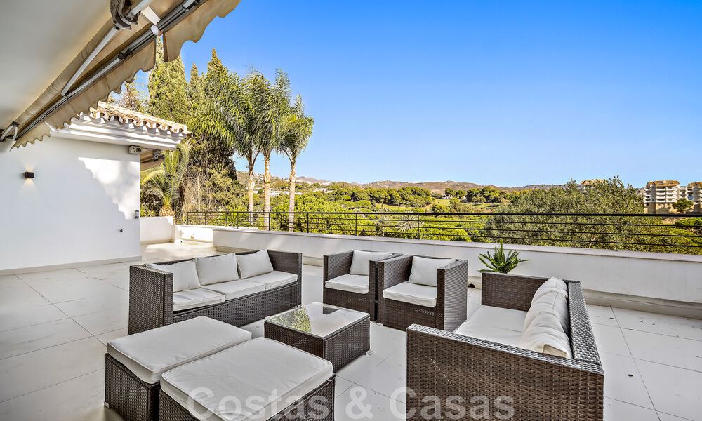 Andalusian luxury villa for sale adjacent to golf course, with sea views, in highly sought-after location in East Marbella 48347