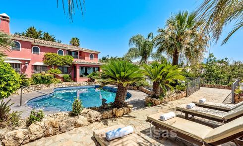 Traditional and luxurious Andalusian-style country house for sale with sea views in the heart of the golf valley of Nueva Andalucia, Marbella 49210