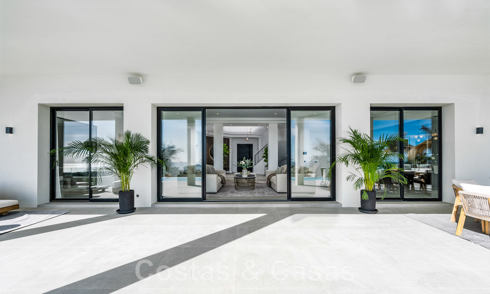 Exclusive designer villa with panoramic sea views for sale in the a five-star golf resort in Marbella - Benahavis 48855