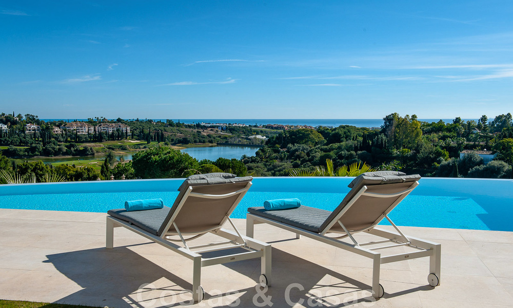 Frontline golf luxury villa in an elegant modern style with stunning golf and sea views for sale in Los Flamingos Golf resort in Marbella - Benahavis 49006