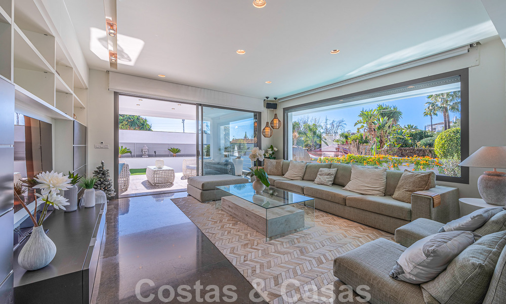 Luxury villa in contemporary architectural style for sale with sea views, located in a desirable residential area on Marbella's Golden Mile 50166
