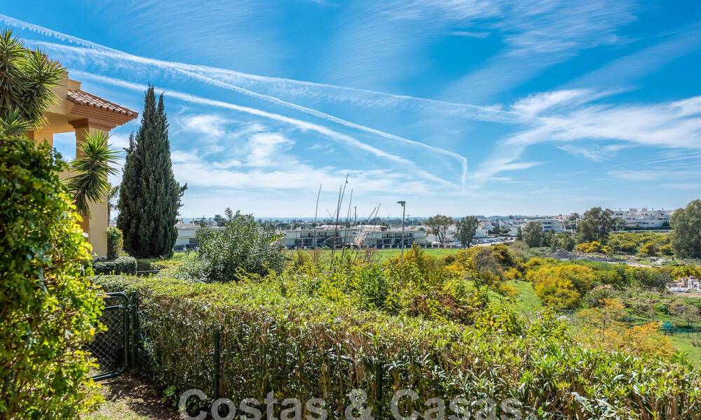 Garden apartment for sale within walking distance of Puerto Banus and the beach in a gated urbanisation in Nueva Andalucia, Marbella 55203