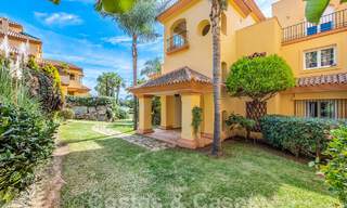 Garden apartment for sale within walking distance of Puerto Banus and the beach in a gated urbanisation in Nueva Andalucia, Marbella 55206 