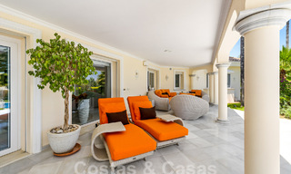 Mediterranean luxury villa for sale with 6 bedrooms in privileged golf surroundings in Nueva Andalucia's valley, Marbella 53170 