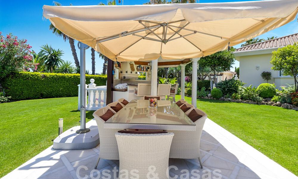 Mediterranean luxury villa for sale with 6 bedrooms in privileged golf surroundings in Nueva Andalucia's valley, Marbella 53180