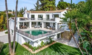 Spacious luxury villa for sale with a traditional architectural style located in a preferred residential area on the New Golden Mile, Marbella - Benahavis 55006 
