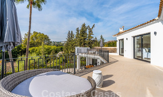 Spacious luxury villa for sale with a traditional architectural style located in a preferred residential area on the New Golden Mile, Marbella - Benahavis 55015 