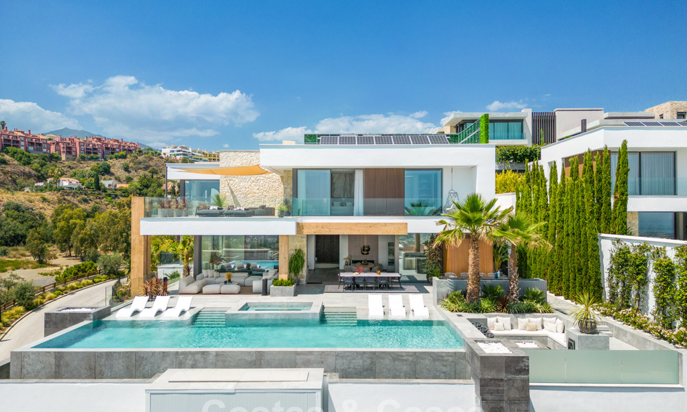 Stunning, architectural luxury villa for sale with open sea views in an elevated gated residential area in the hills of La Quinta in Marbella - Benahavis 54122