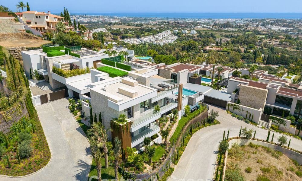 Stunning, architectural luxury villa for sale with open sea views in an elevated gated residential area in the hills of La Quinta in Marbella - Benahavis 54126