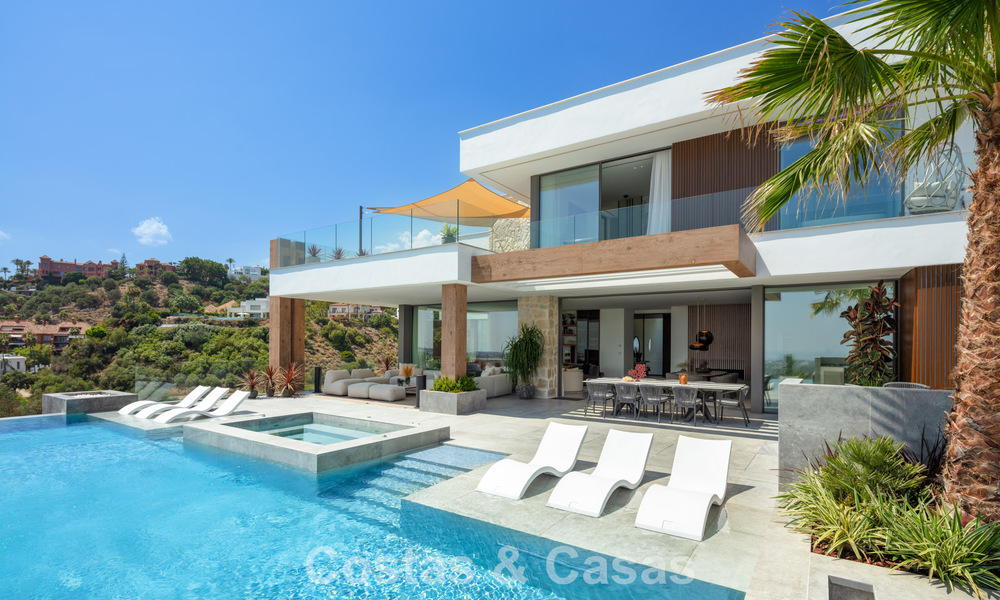 Stunning, architectural luxury villa for sale with open sea views in an elevated gated residential area in the hills of La Quinta in Marbella - Benahavis 54142