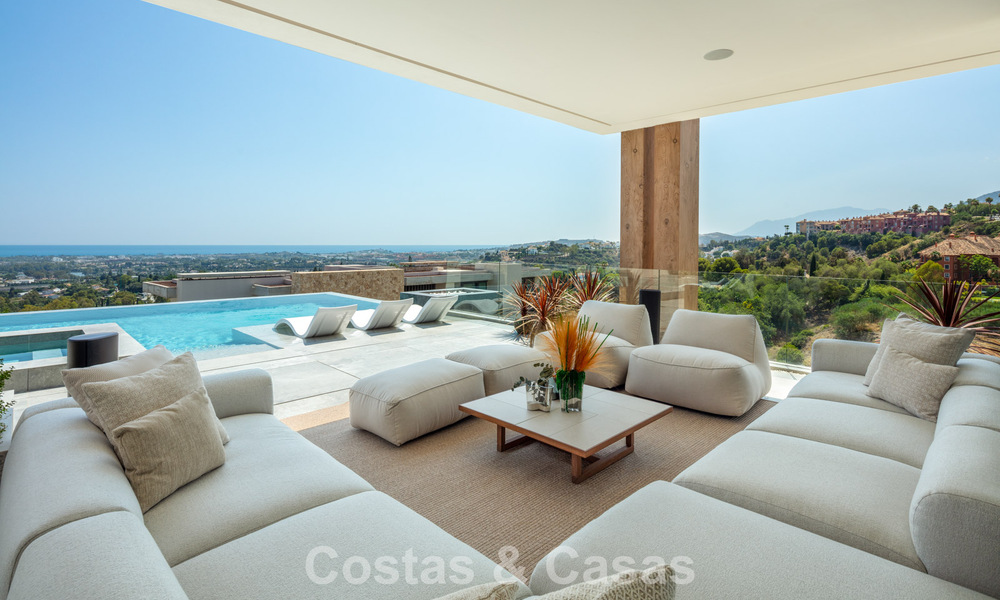 Stunning, architectural luxury villa for sale with open sea views in an elevated gated residential area in the hills of La Quinta in Marbella - Benahavis 54143