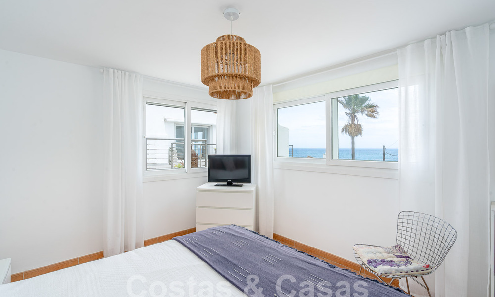 Mediterranean villa for sale with contemporary interior and frontal sea views in gated beachside urbanisation of Estepona 55819