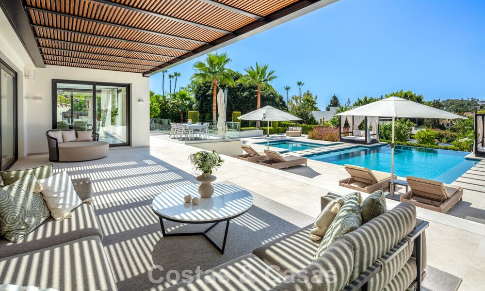 Modern, symmetrical, luxury villa for sale a stone's throw from the golf courses of Nueva Andalucia's valley, Marbella 56183