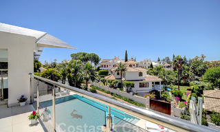 Modern luxury villa for sale looking at the golf in Nueva Andalucia, Marbella 60797 