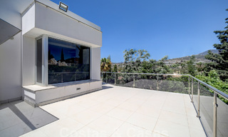 Modern luxury villa for sale looking at the golf in Nueva Andalucia, Marbella 60800 