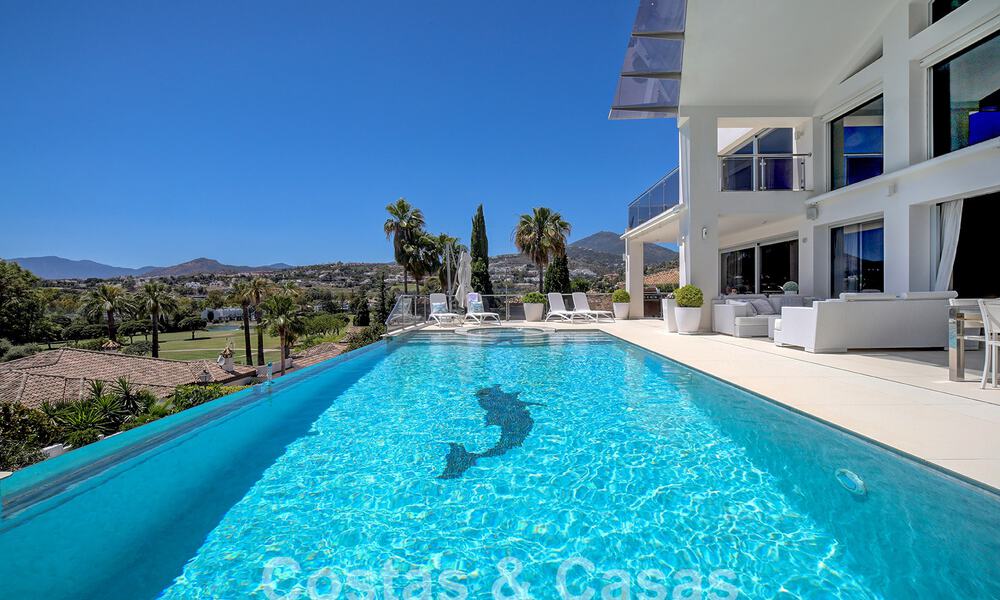 Modern luxury villa for sale looking at the golf in Nueva Andalucia, Marbella 60837