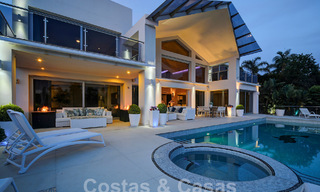 Modern luxury villa for sale looking at the golf in Nueva Andalucia, Marbella 60841 