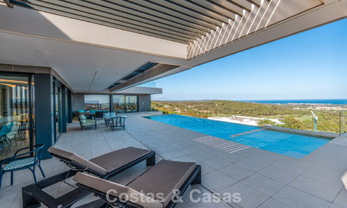 Stylish, modern luxury villa for sale with sea views in a preferred, gated community of Sotogrande, Costa del Sol 63500
