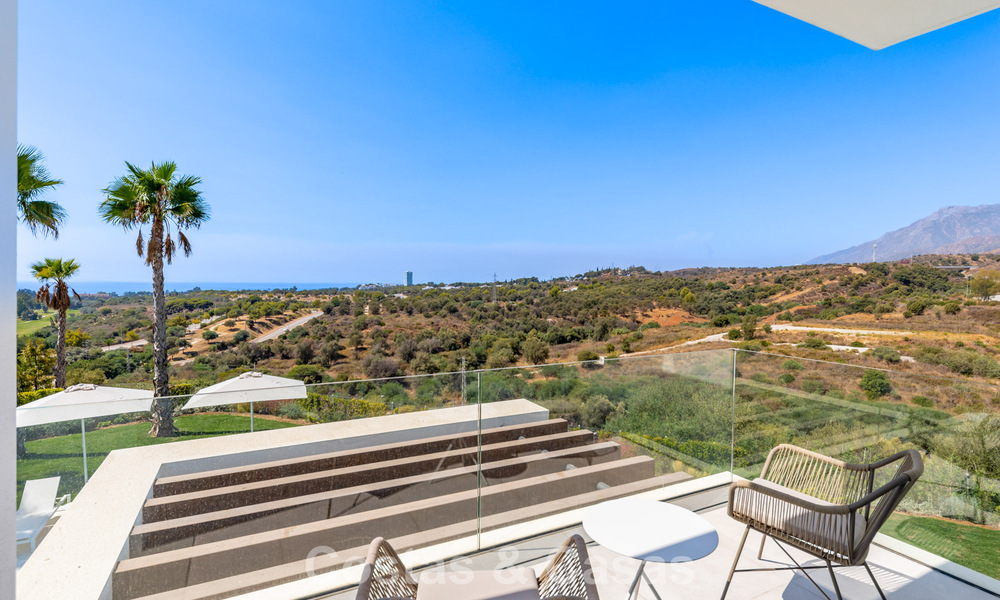 Modernist villa with sleek design and stunning sea views for sale in gated golf community in East Marbella 63589