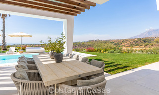 Modernist villa with sleek design and stunning sea views for sale in gated golf community in East Marbella 63595 