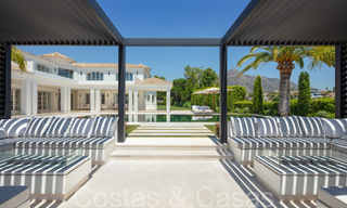 Stunning luxury villa with modern Mediterranean architectural style for sale, first line golf in Nueva Andalucia, Marbella 64521 