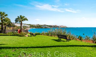 Trendy beach house for sale with stunning sea views in a first line beach complex close to Estepona town 65385 