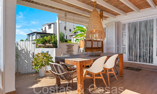 Trendy beach house for sale with stunning sea views in a first line beach complex close to Estepona town 65391 