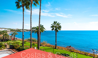 Trendy beach house for sale with stunning sea views in a first line beach complex close to Estepona town 65402 
