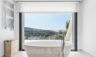 Modernist luxury villa for sale in a gated urbanization in La Quinta, Marbella - Benahavis 65722 