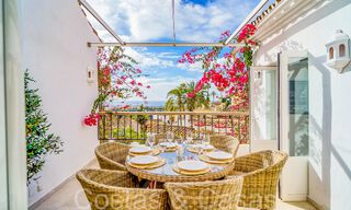 Picturesque townhouse with sea views and independent studio for sale in a gated community the hills of Marbella - Benahavis 65967 