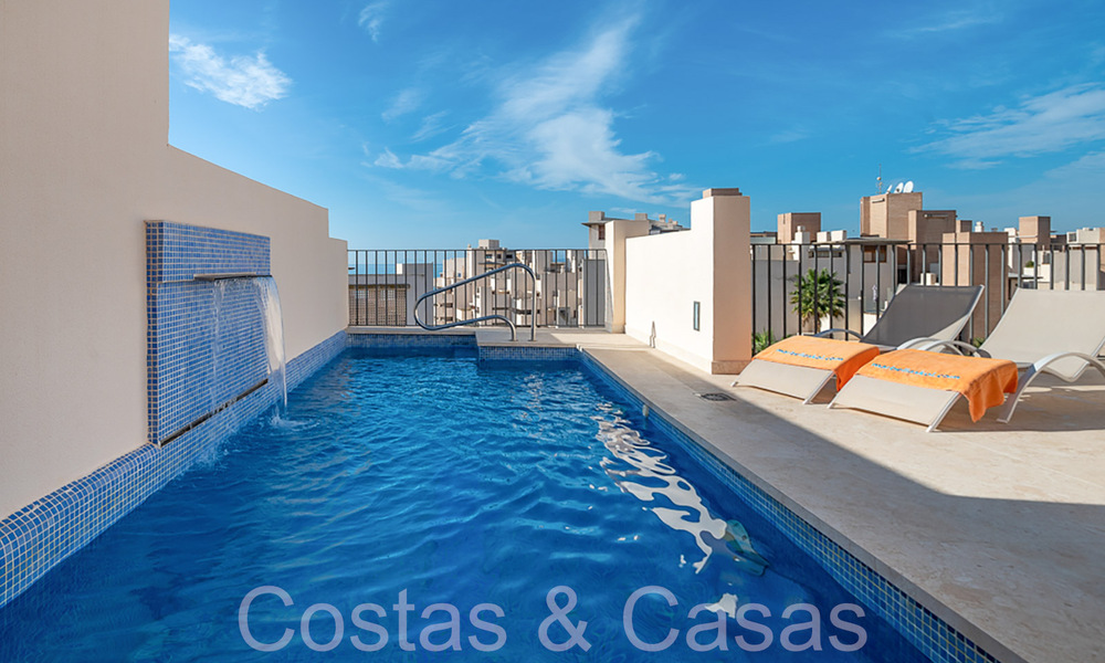 Contemporary duplex penthouse for sale in a first line beach complex with private pool between Marbella and Estepona 66576