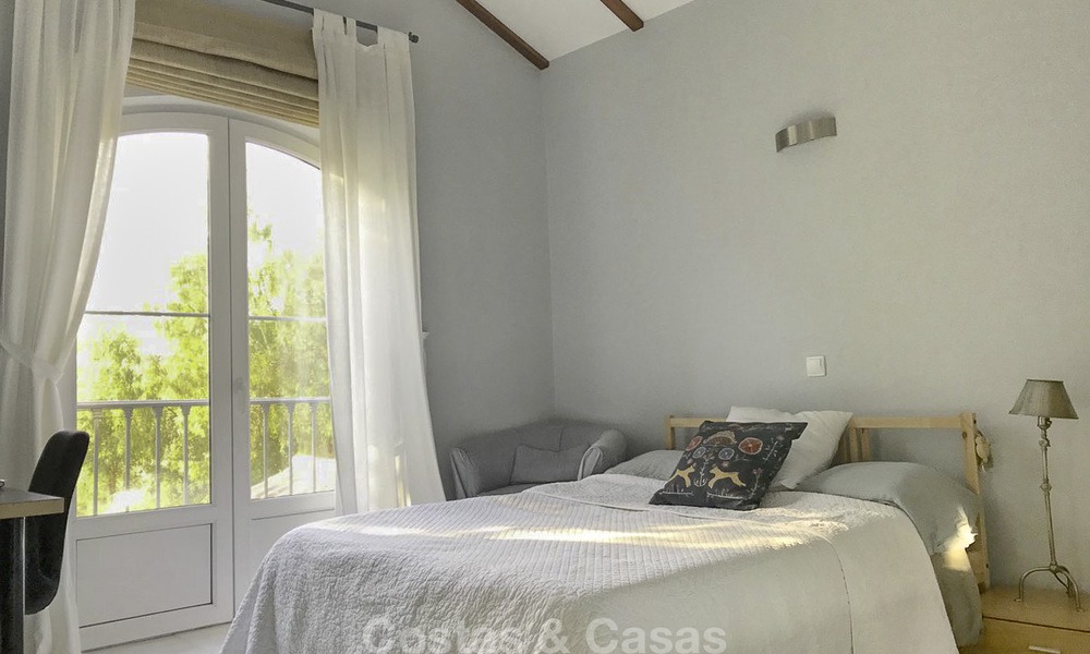 Cozy semi-detached villa for sale on first line golf in Marbella West 14112