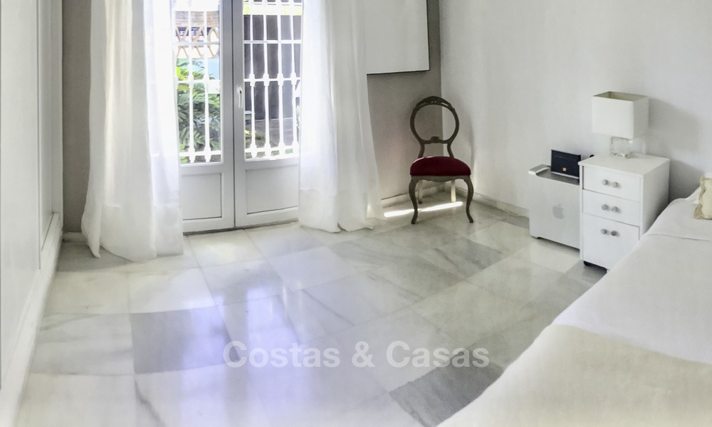 Cozy semi-detached villa for sale on first line golf in Marbella West 14118