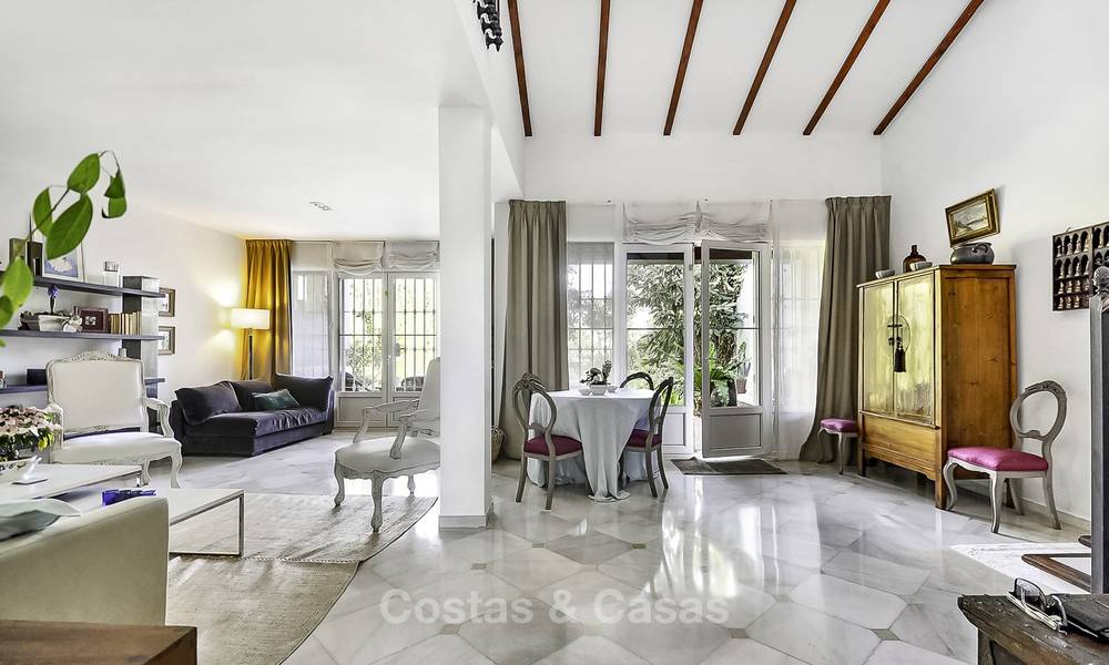 Cozy semi-detached villa for sale on first line golf in Marbella West 14103