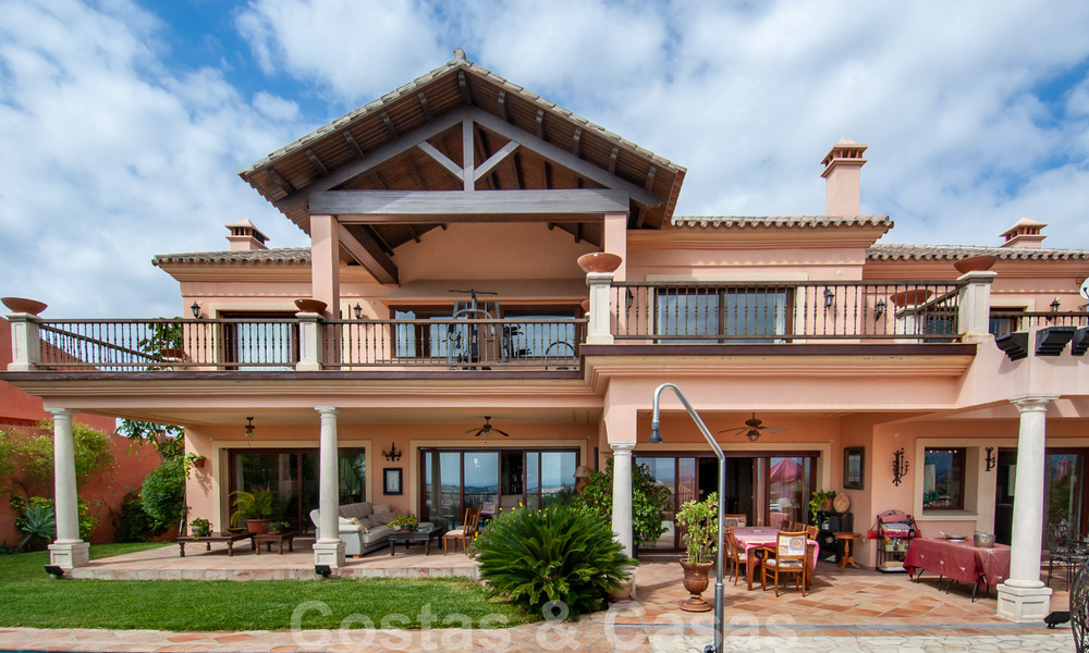 Andalusian styled golf villa for sale in Marbella - Benahavis with panoramic sea and golf views 31146