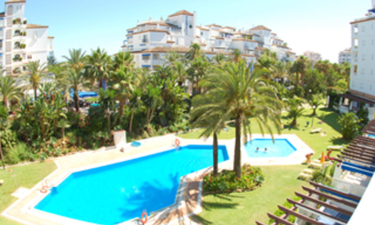 Beachside luxury apartment for sale in Playas del Duque, Puerto Banus, Marbella 1