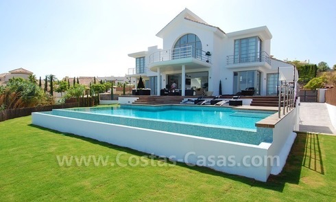 Distressed sale - Modern style villa for sale in a gated golf resort between Marbella, Benahavis and Estepona 