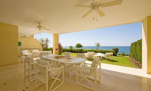 Frontline beach garden apartment for sale in Cabopino, Marbella 