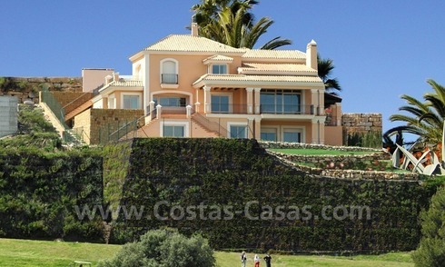 Luxury front line golf villa for sale in Marbella - Benahavis with spectacular views to the sea, golf and mountains 