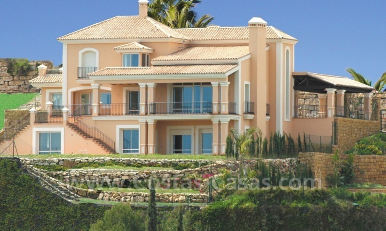 Luxury front line golf villa for sale in Marbella - Benahavis with spectacular views to the sea, golf and mountains 1