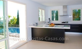 Luxury front line golf villa for sale in Marbella - Benahavis with spectacular views to the sea, golf and mountains 11