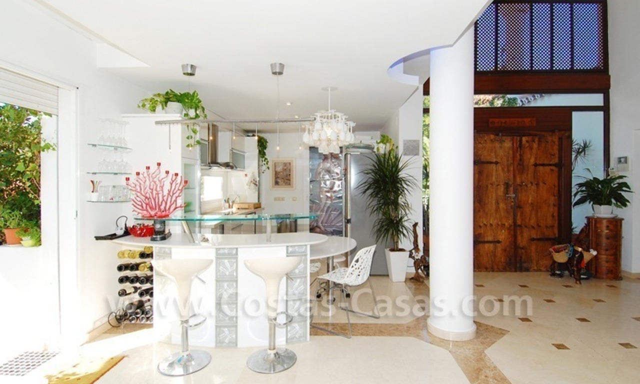 Modern beachside villa for sale, close to the beach, in the area between Marbella and Estepona 12