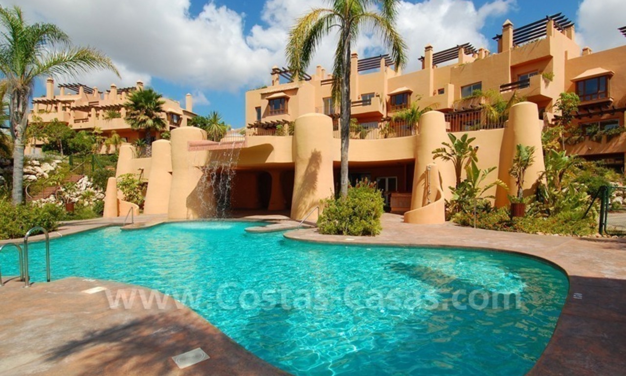 Exclusive modern andalusian styled townhouses for sale close to East Marbella at the Costa del Sol 0
