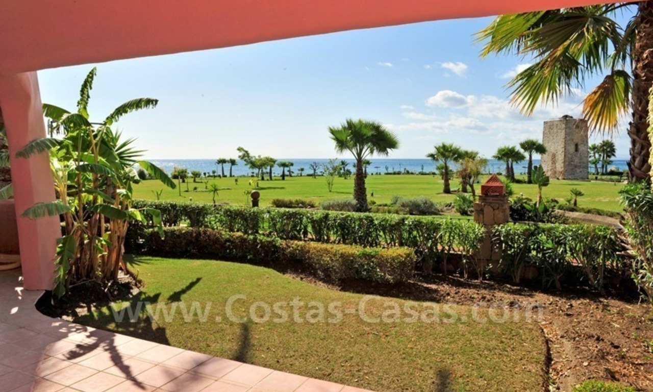 Frontline beach luxury apartment for sale in an exclusive beachfront complex between Marbella and Estepona 1