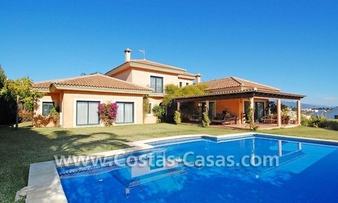 Andalusian style detached villa to buy in a golf resort, New Golden Mile - Marbella - Benahavis - Estepona 