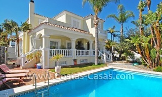 Modern Andalusian styled beachside villa for sale in Marbella 0